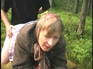 Granny in the forest gets fucked while chopping fire wood